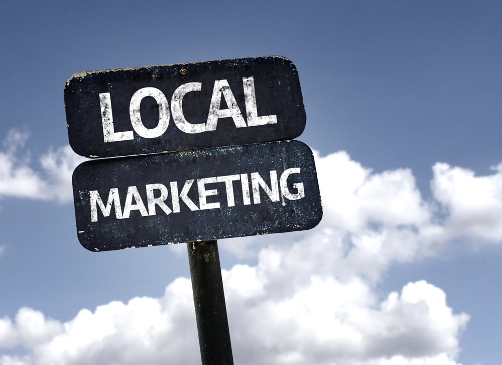 Local Marketing sign with clouds and sky background Local Marketing sign with clouds and sky background